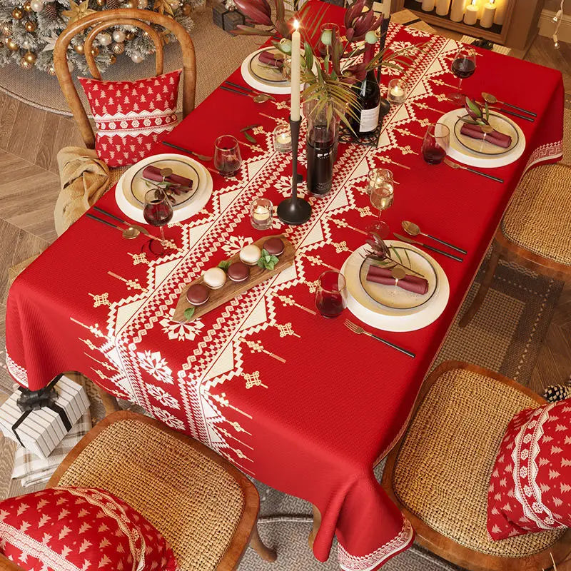 Red and green checkered Christmas tablecloth for home dining.