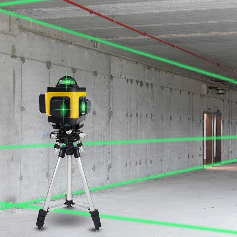 construction worker using green laser level indoors
