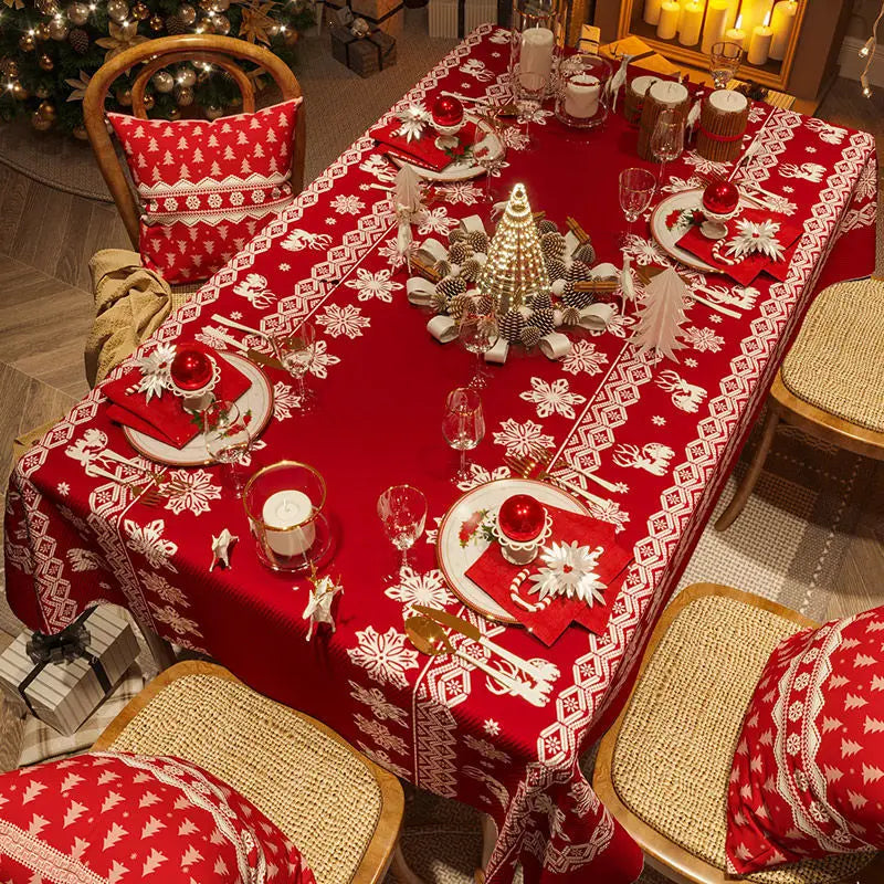 Oilproof holiday tablecloth used for family Christmas dinner.