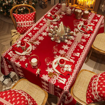 Oilproof holiday tablecloth used for family Christmas dinner.