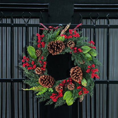 Elegant winter wreath adding festive charm to home exterior.