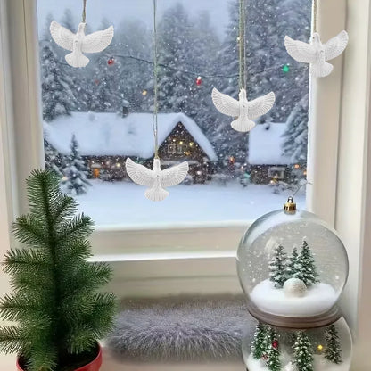 Set of white dove ornaments for Christmas tree décor.