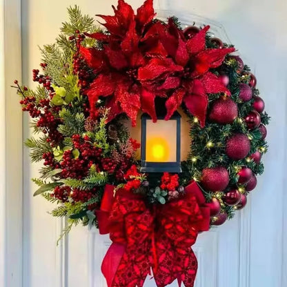 Elegant red and gold holiday wreath glowing softly.