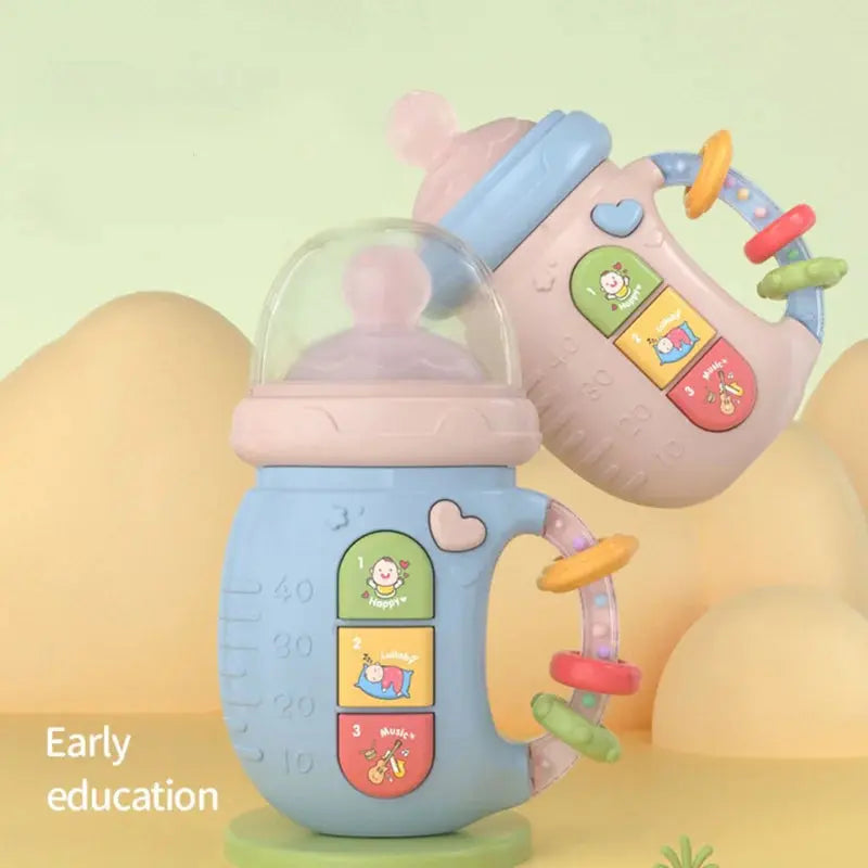 baby holding bottle-shaped rattle with flashing lights
