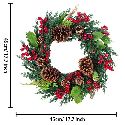 Round Christmas wreath hanging on wooden door.