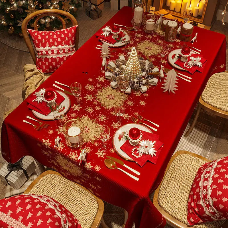 Red and green checkered Christmas tablecloth for home dining.