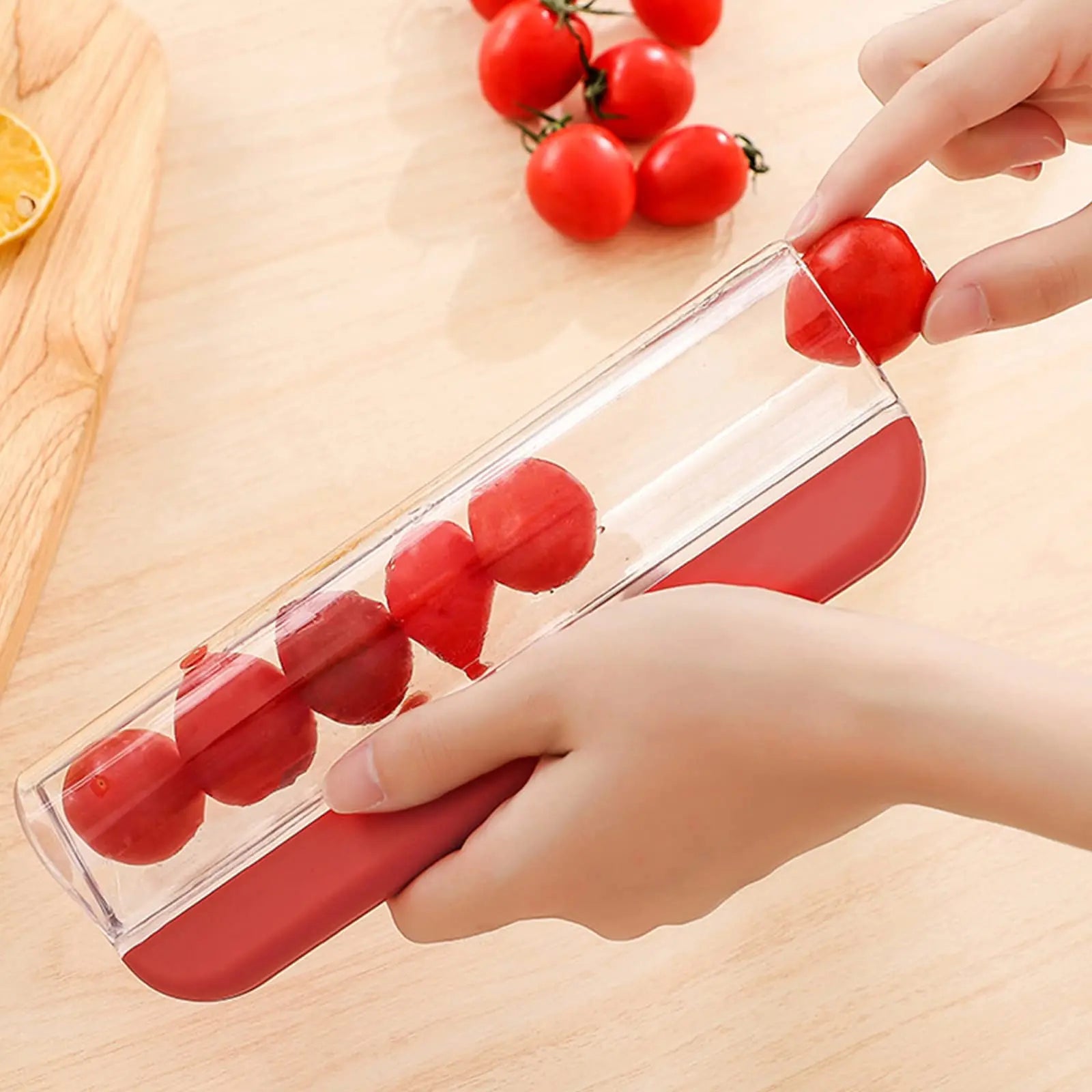 ergonomic fruit cutter in red and green colour options
