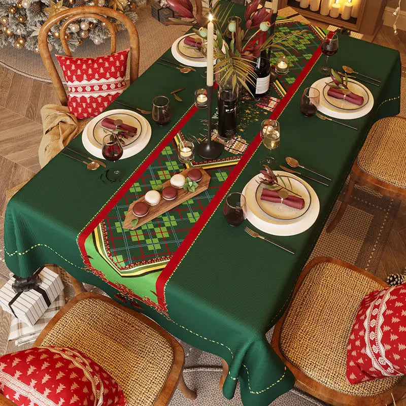 Red and green checkered Christmas tablecloth for home dining.