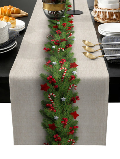 Cozy Christmas dining arrangement with elegant linen runner.