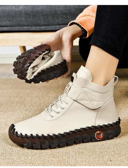 "Round toe winter boots with rubber sole"