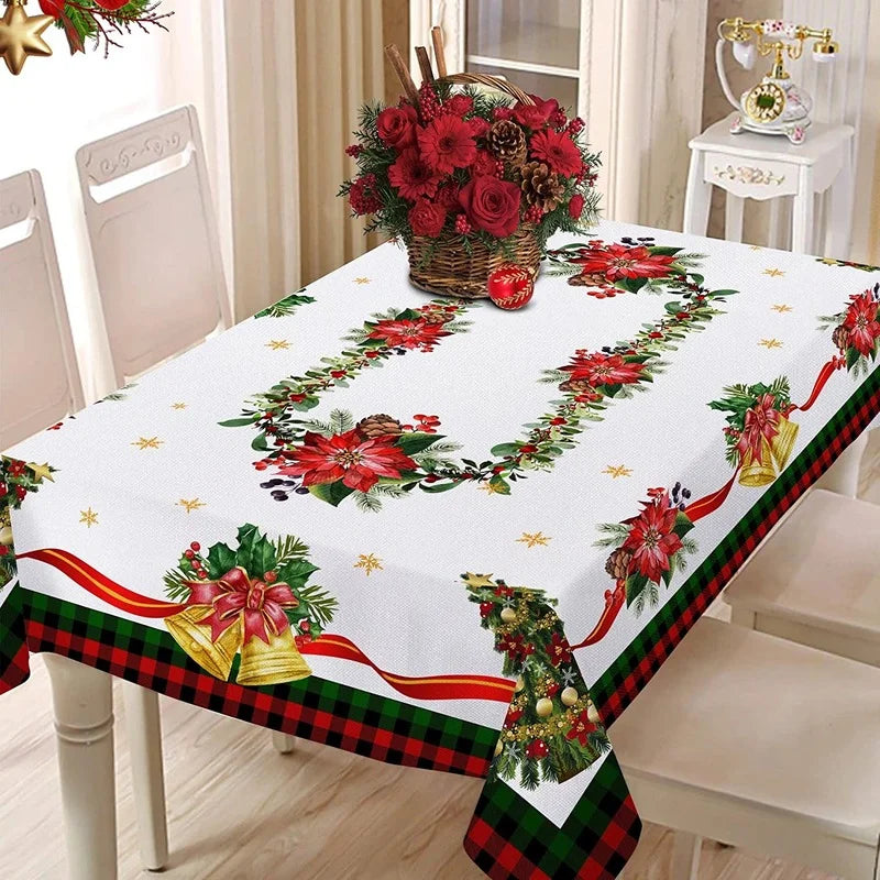Elegant Christmas dining room setup with plaid tablecloth.