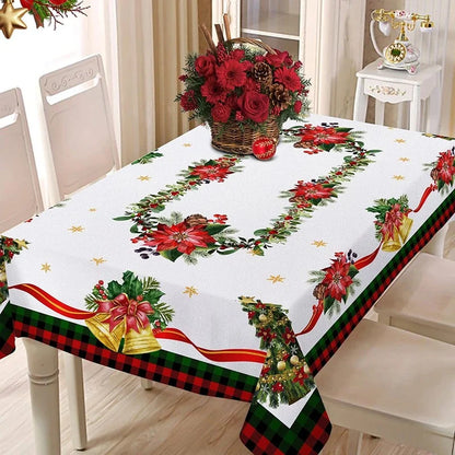 Elegant Christmas dining room setup with plaid tablecloth.