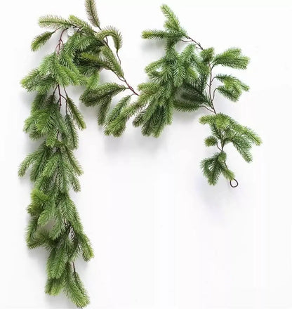 Artificial Christmas garland with pine rattan design hanging on fireplace.