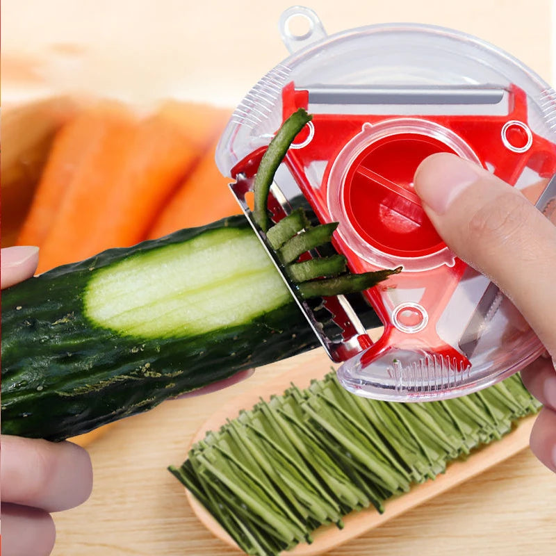 EN: vegetable peeler set shown in red blue and green variants
