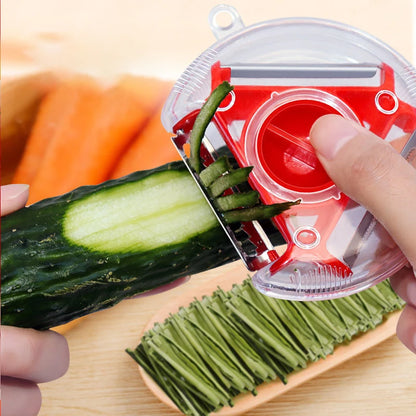 EN: vegetable peeler set shown in red blue and green variants
