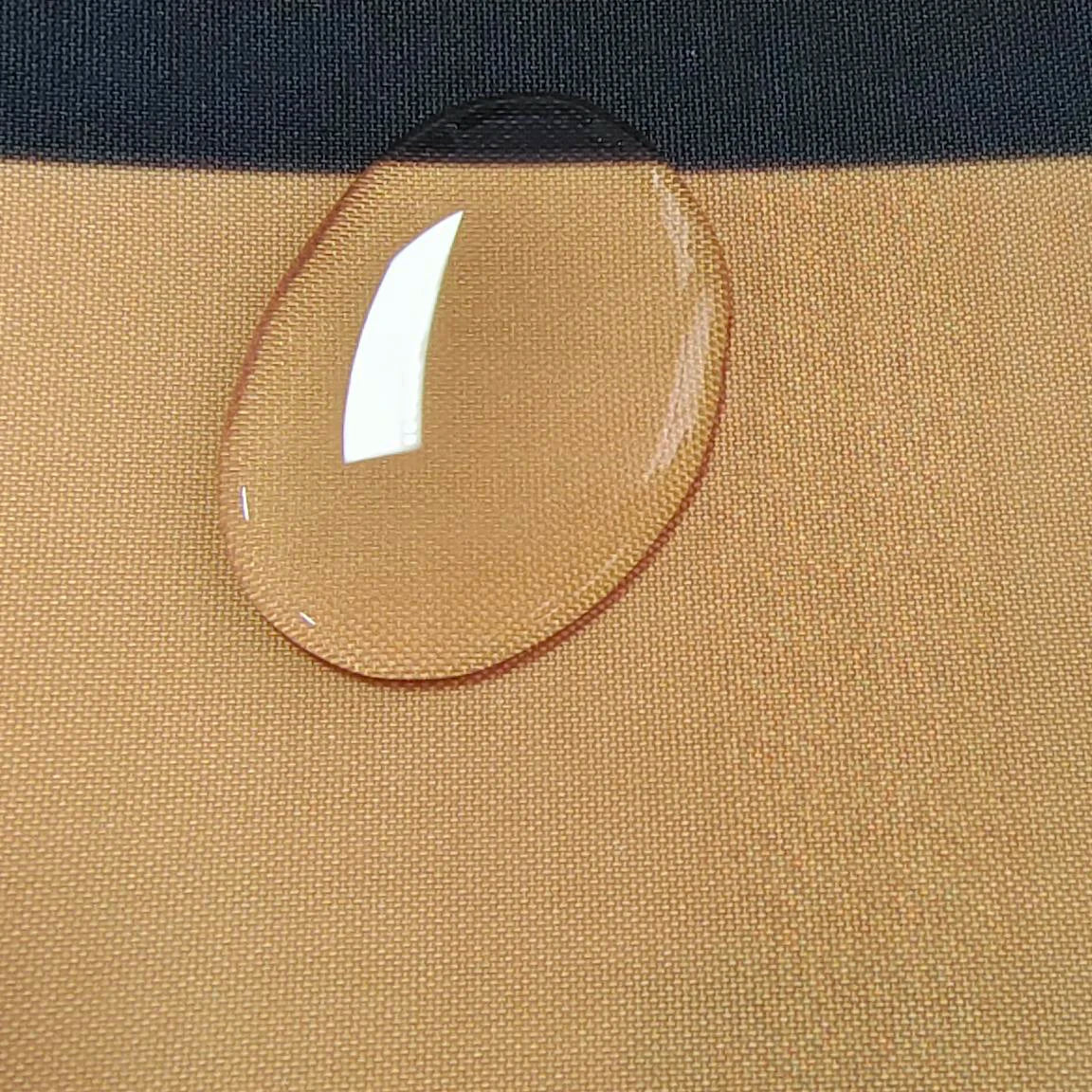 Red plaid waterproof Christmas table cover for dinner setting.